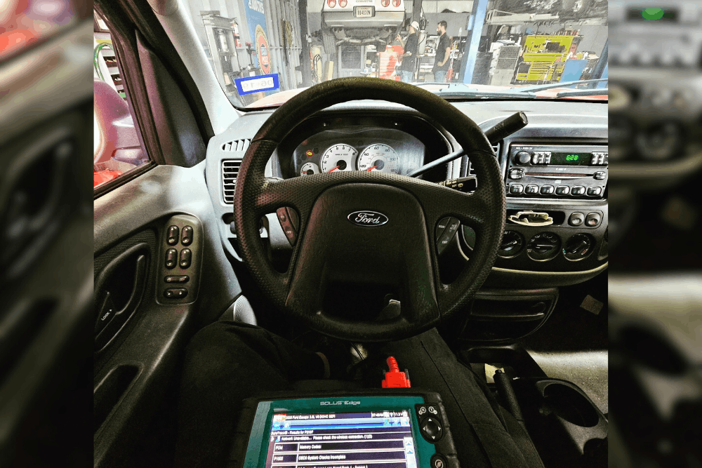 Ford master technician, auto repair in Haslet, TX by Brittni’s Automotive Repair. Image of a technician using an advanced scan tool inside a vehicle, highlighting accurate diagnostics, real-time data analysis, and efficient troubleshooting for reliable performance and repairs.